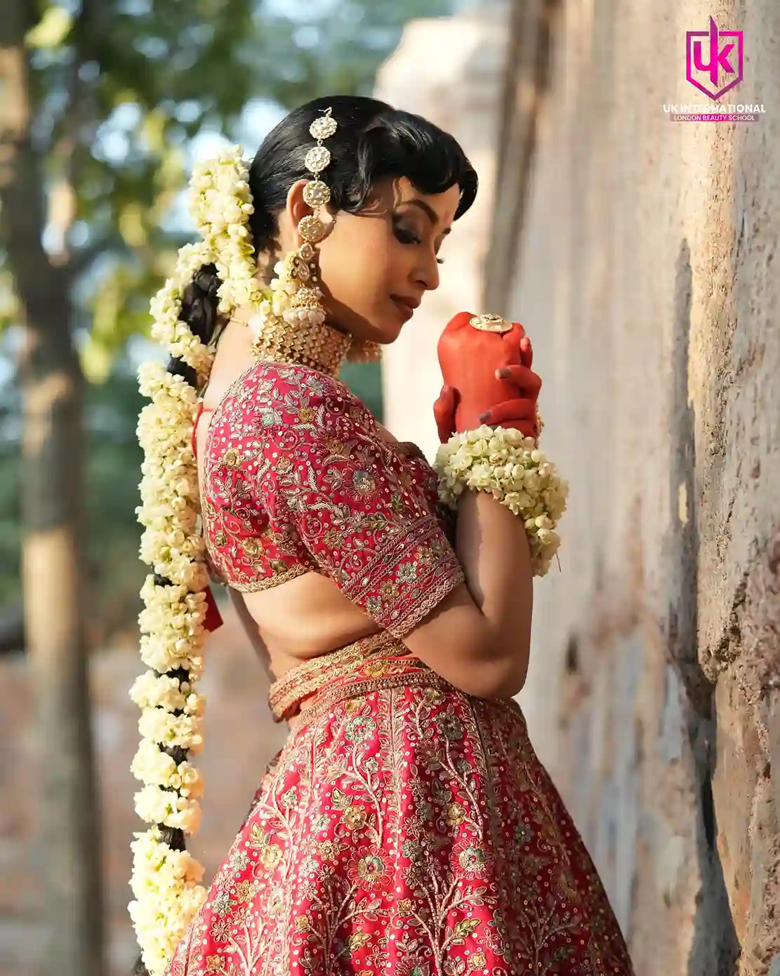 Student practicing bridal makeup techniques